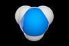 A 3D illustration of a molecule of ammonia, with a nitrogen atom in blue and three hydrogen atoms in white