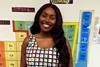 A portrait of a young female science teacher