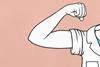 Someone wearing a lab coat flexing their bicep