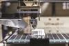 A 3D printer builds up an object layer by layer