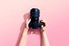 A camera held in two hands