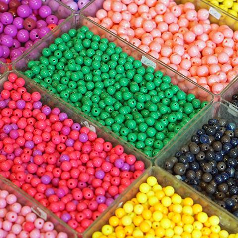 A number of different mixtures of different coloured beads