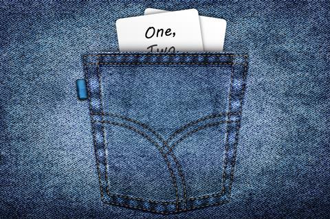A back pocket with some cards in. The top card says one, two.